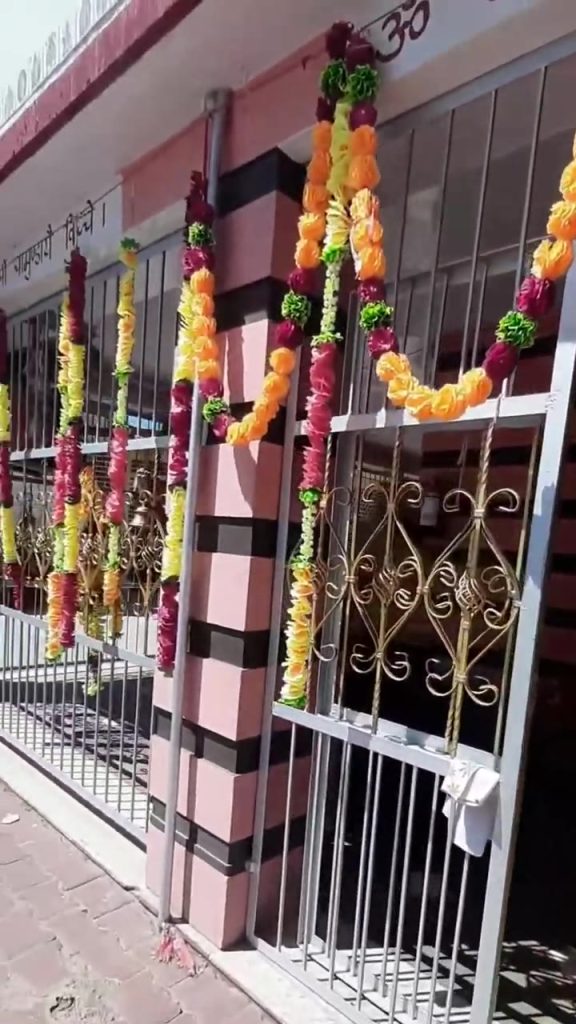 Marigold garlands at the Kunjapuri Devi temple gate