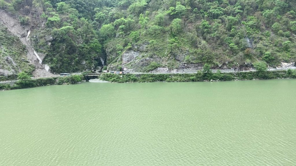 Emerald Yamuna reservoir on the road to Bhadraj Temple